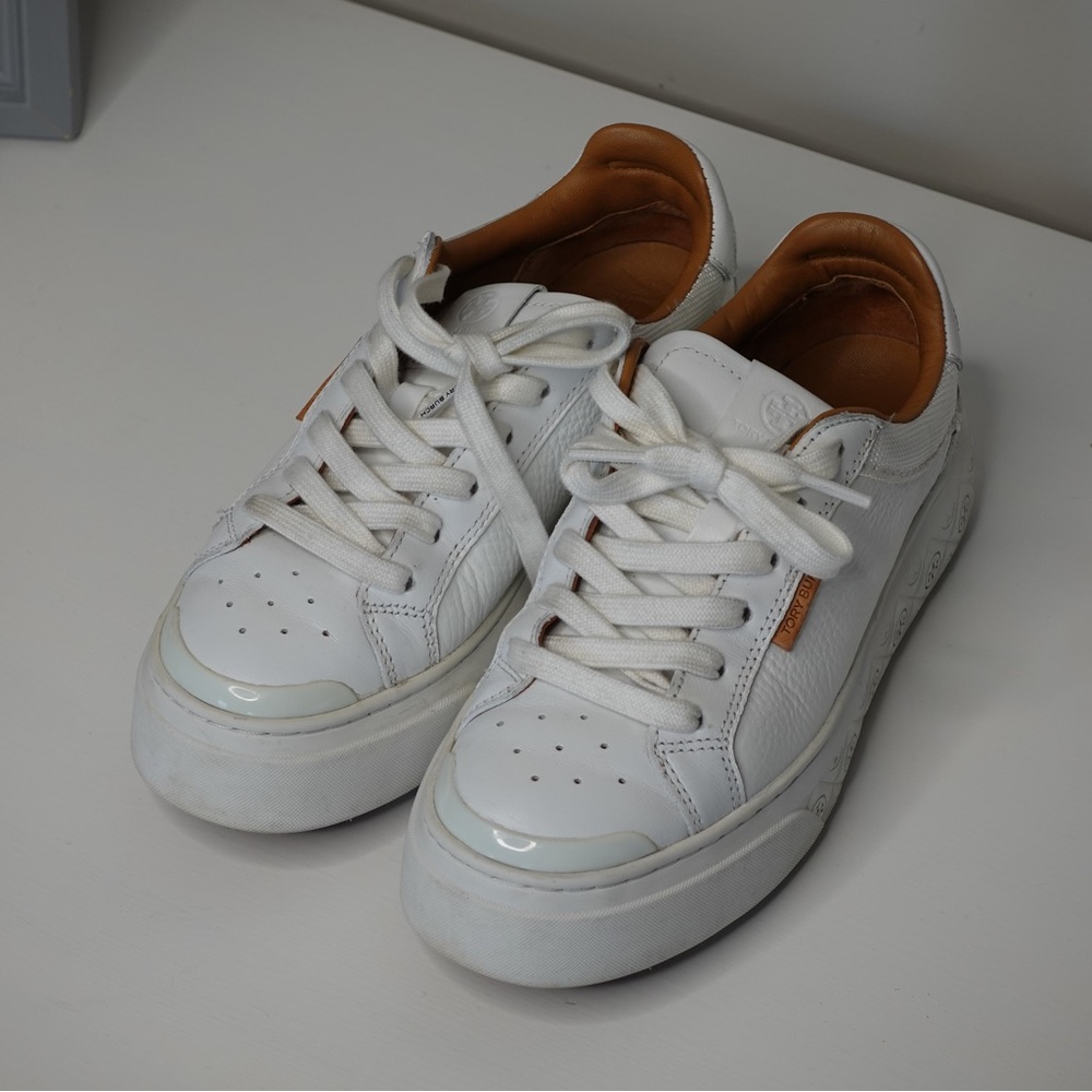 Tory Burch Ladybug white sneakers.